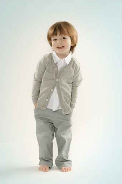 أجمل الأطفال يرتدون أروع المعاطف الشتوية 